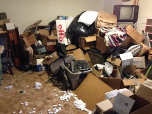 junk and boxes in living room